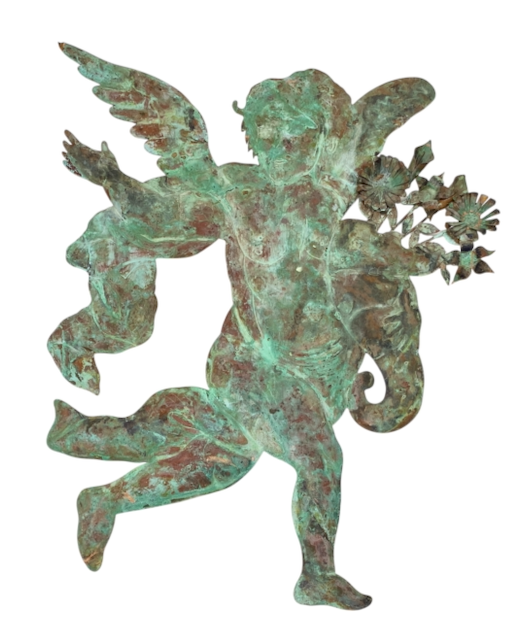 A Pair of Large Patinated Repoussé Copper Cupids