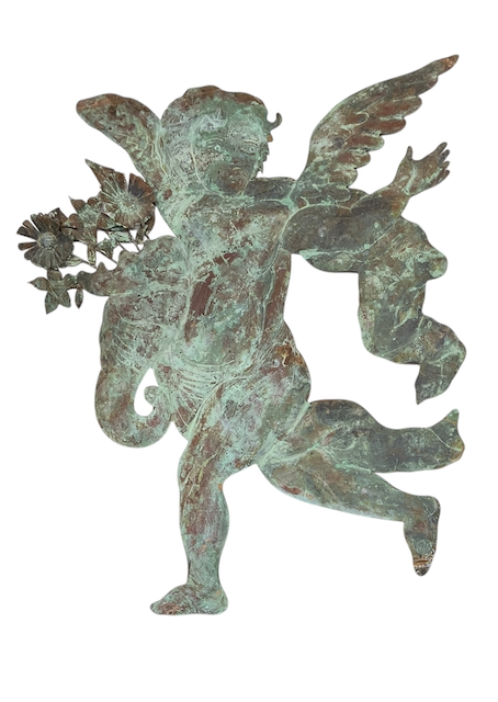 A Pair of Large Patinated Repoussé Copper Cupids